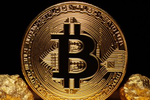 Golden Bitcoin Coin and mound of gold on black background