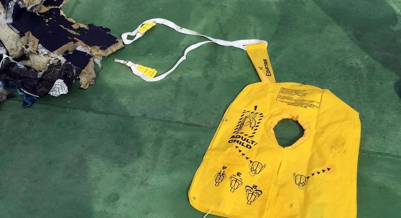 Recovered debris of the EgyptAir jet that crashed in the Mediterranean Sea is seen with the Arabic caption life jacket in this handout image released May 21, 2016 by Egypt's military. 