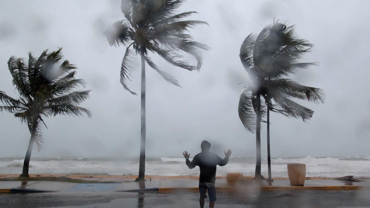 A man reacts in the winds and rain in Luquillo as Hurricane Irma slammed across islands in the northern Caribbean