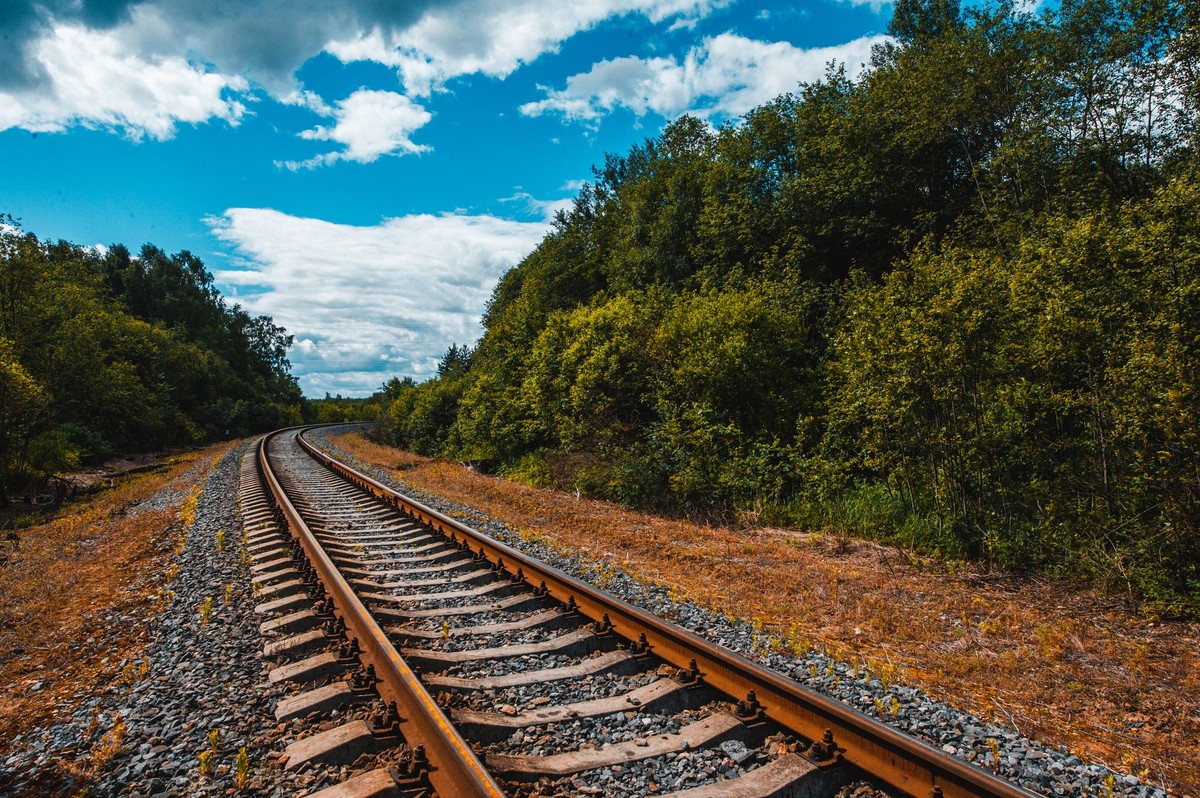 Railway,Station,Against,Beautiful,Colorful,Sky,At,Sunset.,Industrial,Landscape