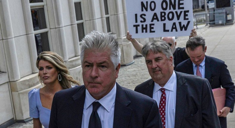 The legal team of former US President Donald Trump, led by M. Evan Corcoran (C), along with Lindsey Halligan (L), James Trusty (Center-R), and Christ Kise (R) arrive at the Brooklyn Federal Courthouse. on September 20, 2022 in New York City.