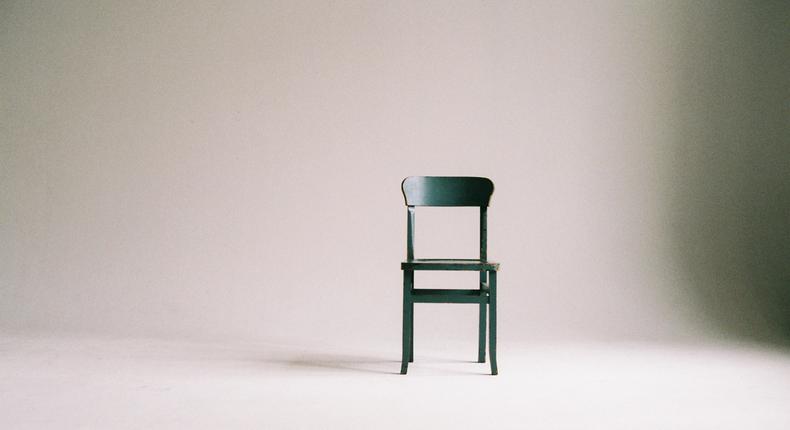 green-wooden-chair-on-white-surface-963486