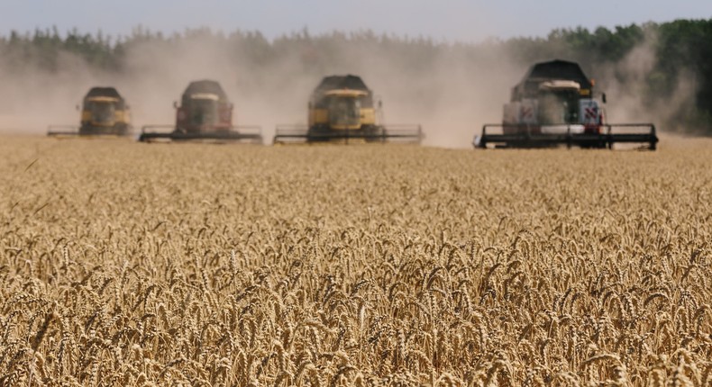 Harvesting combines in the fields of Novovodolazhsky district of Kharkiv region, Ukraine.