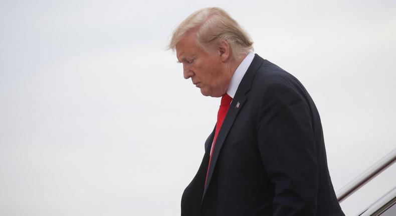 FILE PHOTO: U.S. President Donald Trump walks down the steps of Air Force One as he returns to Washington from a trip to New York City at Joint Base Andrews, Maryland, U.S., May 17, 2019. REUTERS/Leah Millis