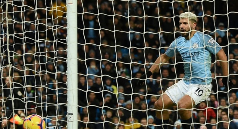 Handy hat-trick: Sergio Aguero scored three goals as Manchester City beat Arsenal 3-1 on Sunday