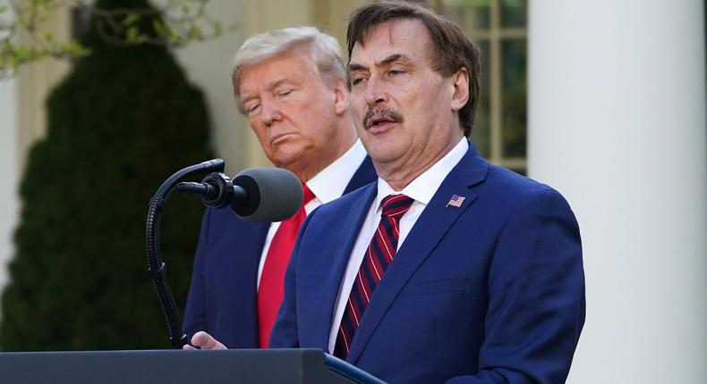 Former president Trump and Mike Lindell at the White House last year.
