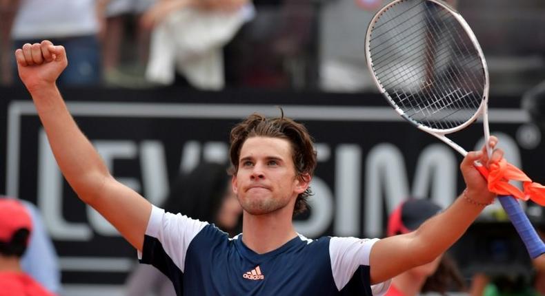 Austria's Dominic Thiem celebrates after defeating Spain's Rafael Nadal at the ATP Tennis Open tournament on May 19, 2017