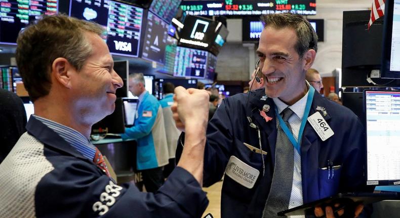 trader nyse celebrate happy fist bump