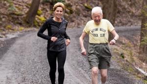 Personal trainer Lauren Hurst and 98-year-old runner George Etzweiler.Lauren Hurst