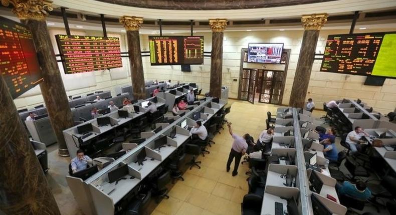 Traders work at the Egyptian stock exchange in Cairo, Egypt in this August 23, 2015 file photo REUTERS/Mohamed Abd El Ghany/Files