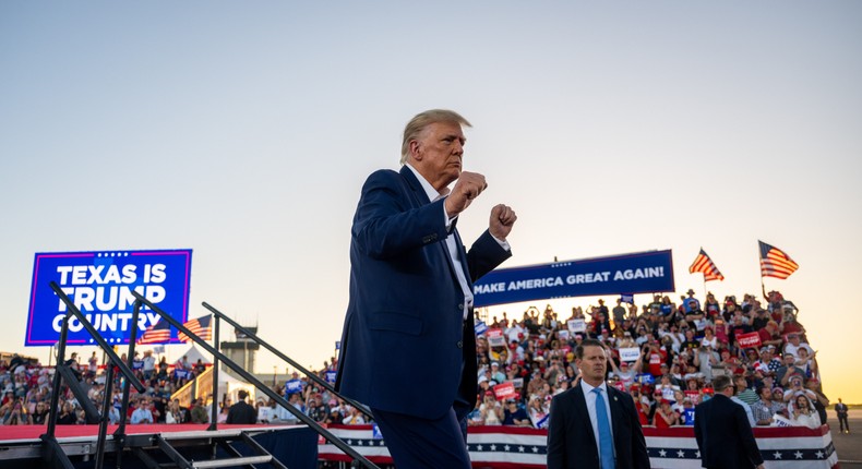 Former US President Donald Trump dances while exiting after speaking during a rally at the Waco Regional Airport on March 25, 2023 in Waco, Texas.Brandon Bell/Getty Images