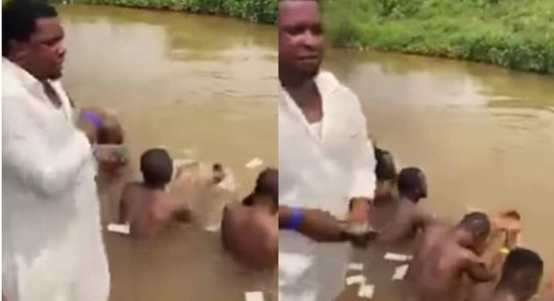 Pastor sprays cash on naked men inside river as he performs money ritual