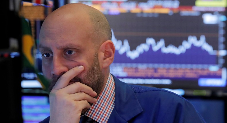 A trader works on the floor of the New York Stock Exchange (NYSE) in New York, U.S., October 23, 2018.