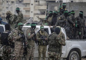 Borci iz Hamasove brigade Al Kasam u izbegličkom kampu Al Nusejrat u Gazi 22. februara