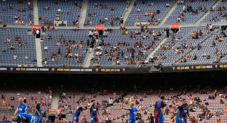 Life after Lionel: Barcelona's players warm up before the Spanish League match against Real Sociedad Creator: Josep LAGO