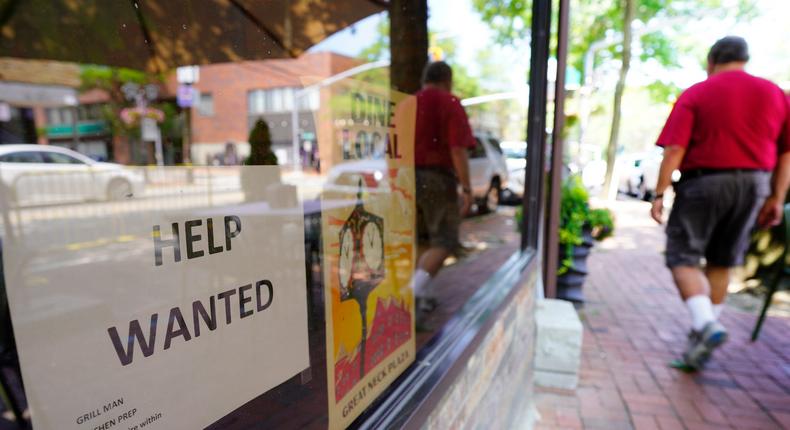 Restaurant storefront on Middle Neck Road in Great Neck has Help Wanted sign in window on July 15, 2021.
