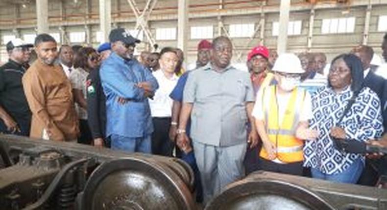 From 3rd left, the Minister of Transportation, Mr Muazu Sambo, the Managing Director, Nigerian Railway Corporation, Mr Fidet Okhiria and the Pem. Sec. Ministry of Transportation, Dr Magdalene Ajani during the Minister’s visit to Kajola to inspect the Rolling stock wagon station on Thursday.
