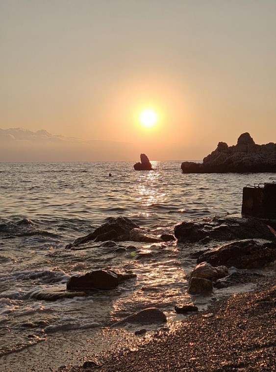 Zachód słońca na plaży we Wlorze