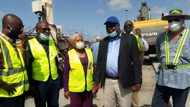 L-R: Mr Kayode Ibrahim, Federal Ministry of Works (FMW) engineer, Mrs Musilimat Aloba, FMW engineer supervising Apapa-Oshodi-Ojota-Oworonshoki Expressway reconstruction project, Mr Kayode Popoola, Federal Controller of Works in Lagos and Mr Ashton Davies, Project Manager, Hitech during the inspection of ongoing Apapa-Oshodi-Ojota-Oworonshoki Expressway Reconstruction project on Wednesday in Lagos. [NAN]