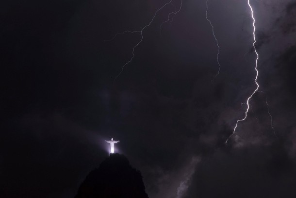 Lighting strikes in front of The Christ the Redeemer statue in Rio de Janeiro