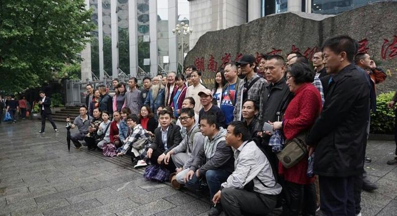 This photo taken on April 25, 2017 shows supporters of lawyer Xie Yang outside the Intermediate People's Court in Changsha, in China's Hunan province