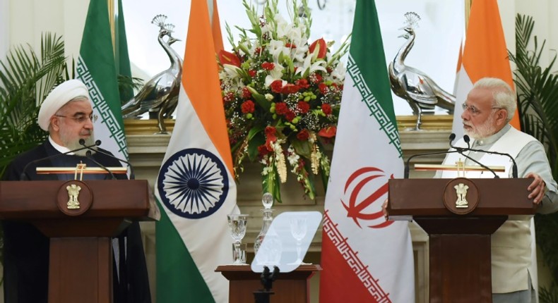 Iranian President Hassan Rouhani meets Indian Prime Minister Narendra Modi on a February 2018 visit to New Delhi