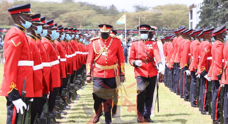 President Uhuru Kenyatta inspects a guard of honour mounted by the Kenya Army during 2021 Jamhuri Day celebrations at Uhuru Gardens, Nairobi