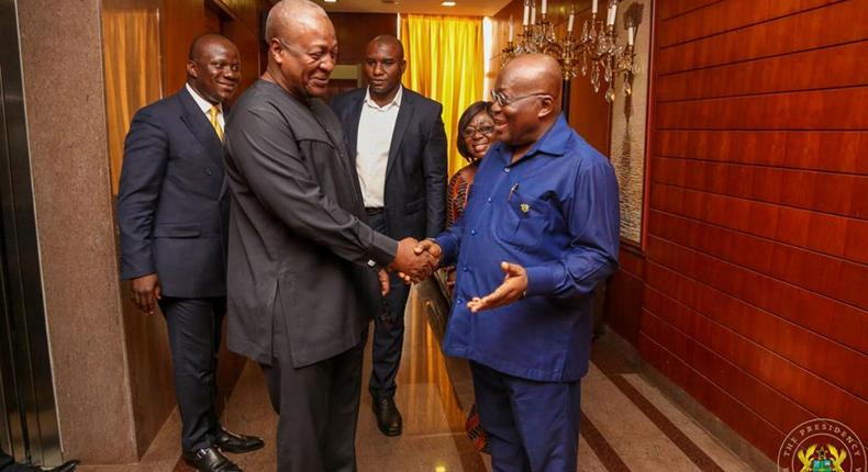 Former president John Mahama and Ghana's president Nana Addo Dankwa Akufo-Addo all smiles