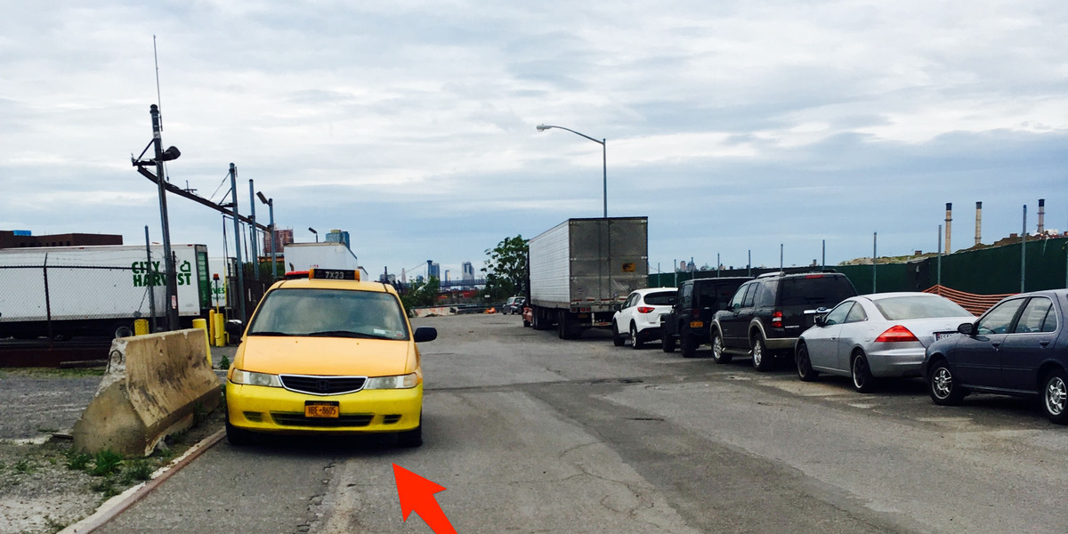 My temporary home, a taxi-turned-"rolling room" in Long Island City, Queens.