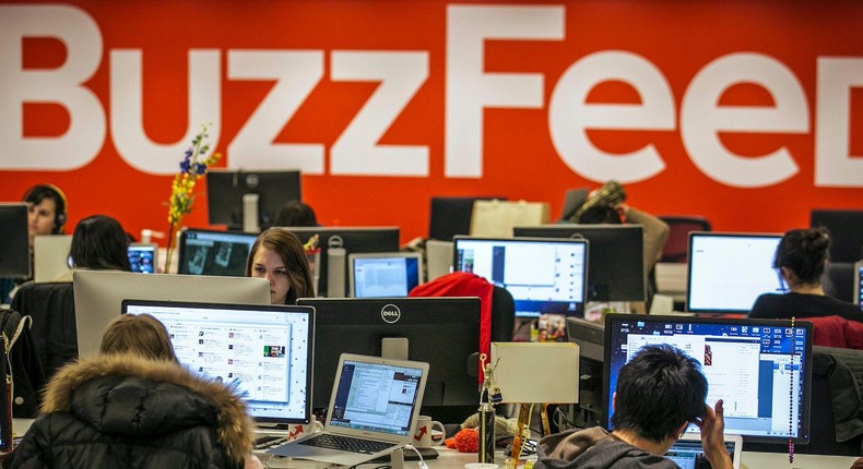 BuzzFeed employees work at the company's headquarters in New York on January 9, 2014.