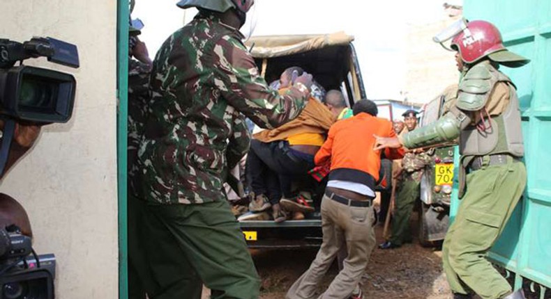 Kenyan police during a past arrest. Court jails 43 suspected terrorists including 38 University students arrested in Nairobi