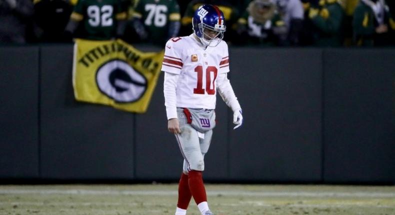 New York Giants quarterback Eli Manning denies knowingly providing fake game-used memorabilia to collectors