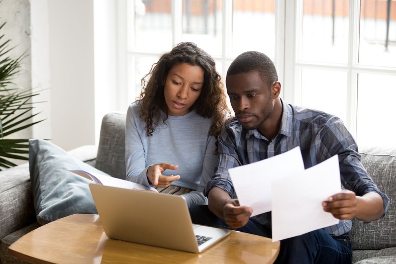 Couple discussing finances (Courtesy) 