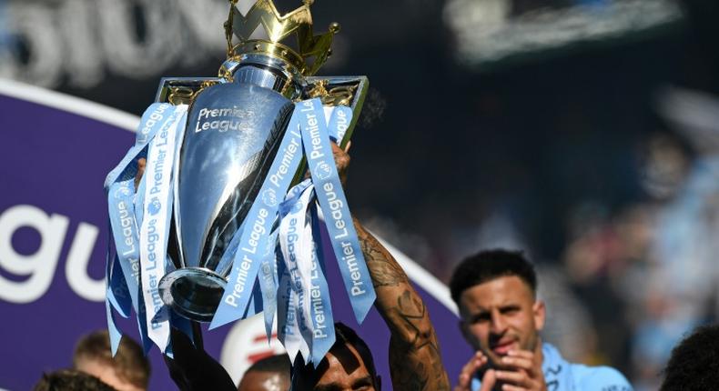 Manchester City players celebrate winning the 2017/18 Premier League title