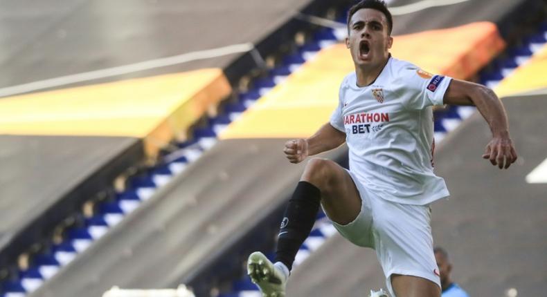 Up for the cup: Sevilla's Sergio Reguilon celebrates his goa against Roma