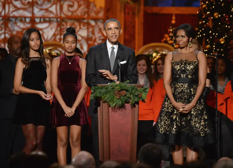 Michelle Obama z mężem i córkami w 2014 r. Fot. Kevin Mazur/WireImag