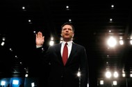 Former FBI Director James Comey sworn in to testify at a hearing in Washington