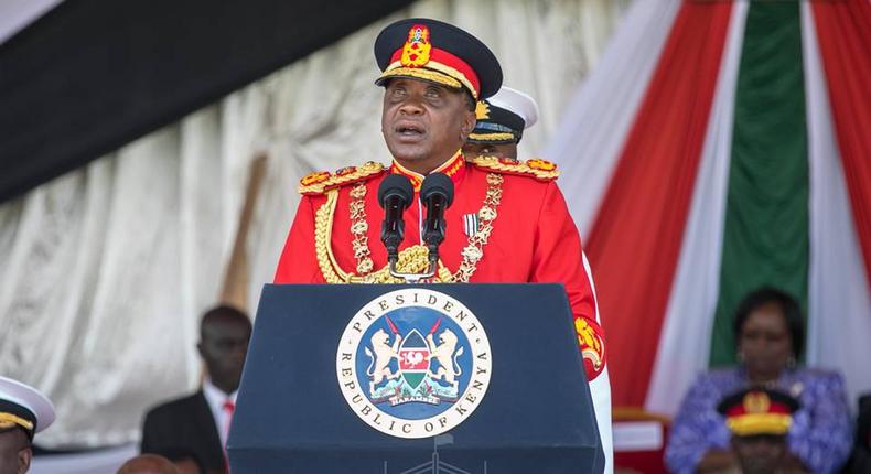 Uhuru dons a red Commander-in-Chief’s ceremonial military uniform (Courtesy)