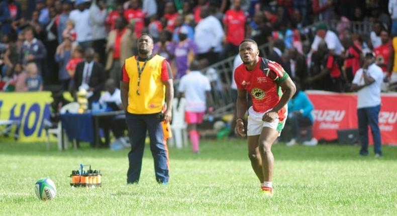 NAIROBI, KENYA - JUNE 30: In this handout image provided by the APO Group, Kenya's Darwin Mukidza takes a conversion as Kenya Simbas beat Zimbabwe Sables 45-36 during the Rugby World Cup qualifier and Rugby Africa Gold Cup match between Kenya and Zimbabwe at RFUEA Ground on June 30, 2018 in Nairobi, Kenya. (Photo by APO Group via Getty Images)
