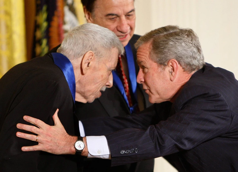 Robert Šerman (L) i Džordž Buš