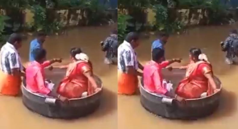 Bride & groom float in a cooking pot to wedding as flooding kills 27 people (video)