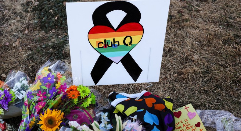 Floral tributes are placed in memory of the victims after a mass shooting at the Club Q gay nightclub in Colorado Springs, Colorado, U.S., November 20, 2022.REUTERS/Kevin Mohatt