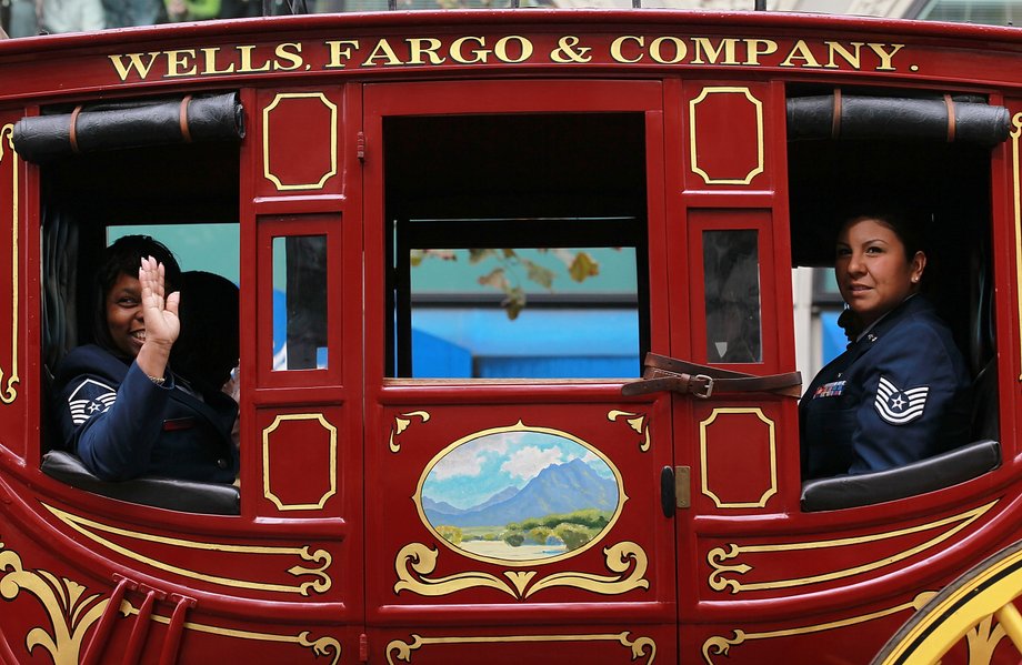 Members of the U.S. Air Force ride in the Wells Fargo stagecoach during the 92nd Annual San Francisco Veterans Day Parade on November 11, 2011 in San Francisco, California.