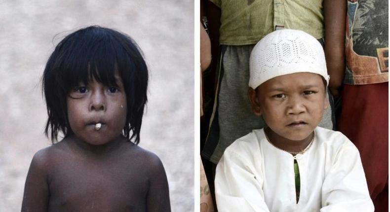 A young boy (L) from the nomadic Orang Rimba tribe -- whose name translates as jungle people, and another boy (R) whose family had converted to Islam