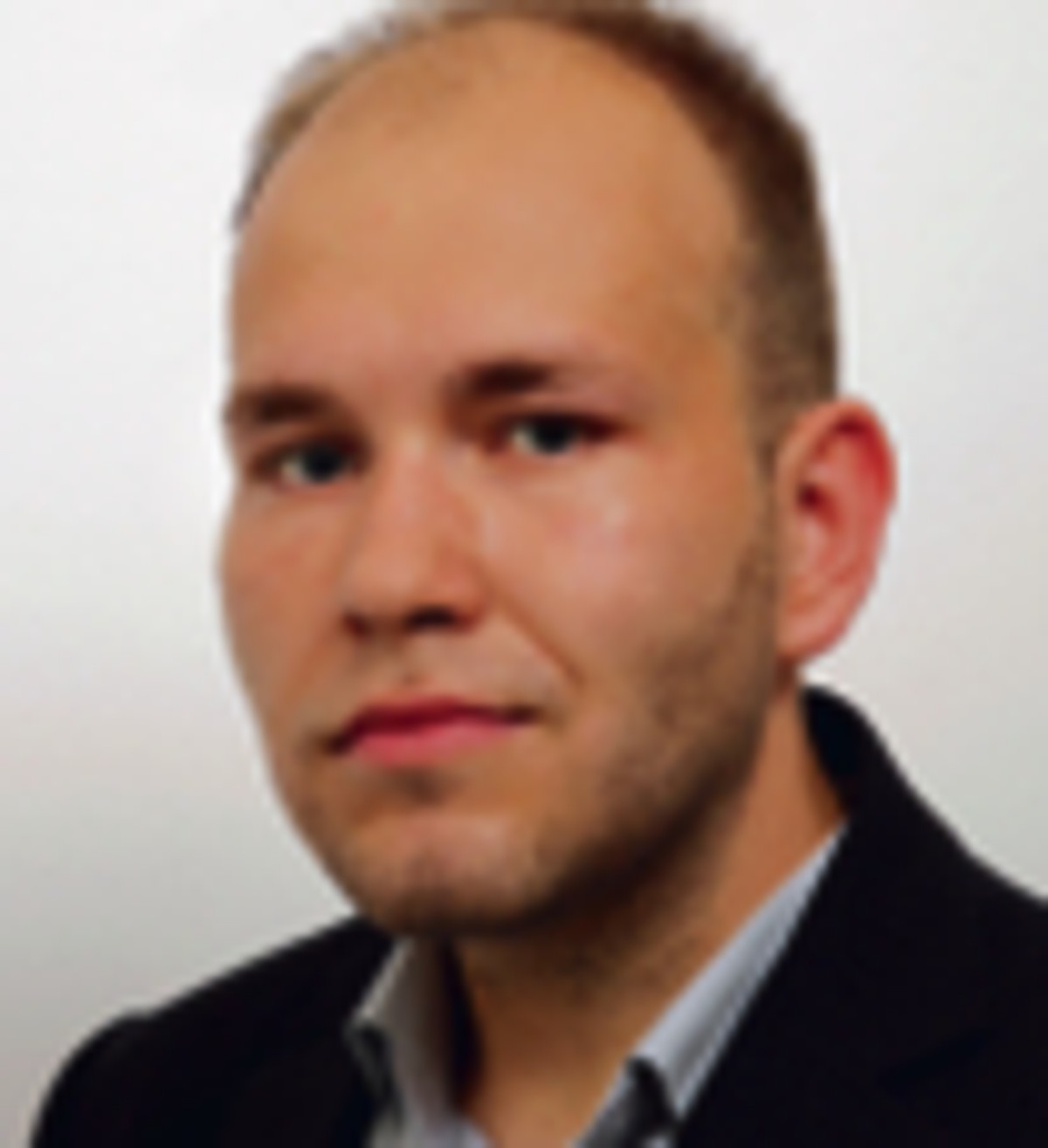 Patryk Słowik, dziennikarz Gazety Prawnej
