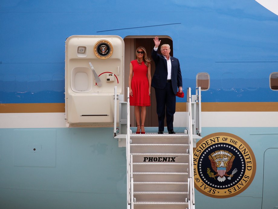 U.S. President Donald Trump and first lady Melania Trump step from Air Force One as they arrive for a "Make America Great Again" rally at Orlando Melbourne International Airport in Melbourne, Florida, U.S. February 18, 2017.