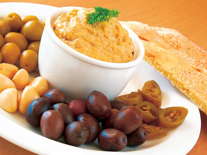 8522_stock-photo-hummus-with-olives-shutterstock_8375329