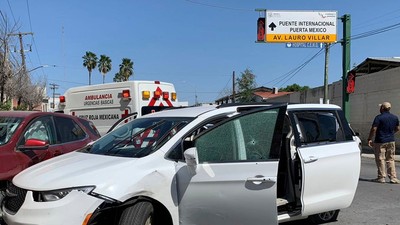 A member of the Mexican security forces stands next to a white minivan with North Carolina plates and several bullet holes, at the crime scene where gunmen kidnapped four U.S. citizens who crossed into Mexico from Texas, Friday, March 3, 2023.AP