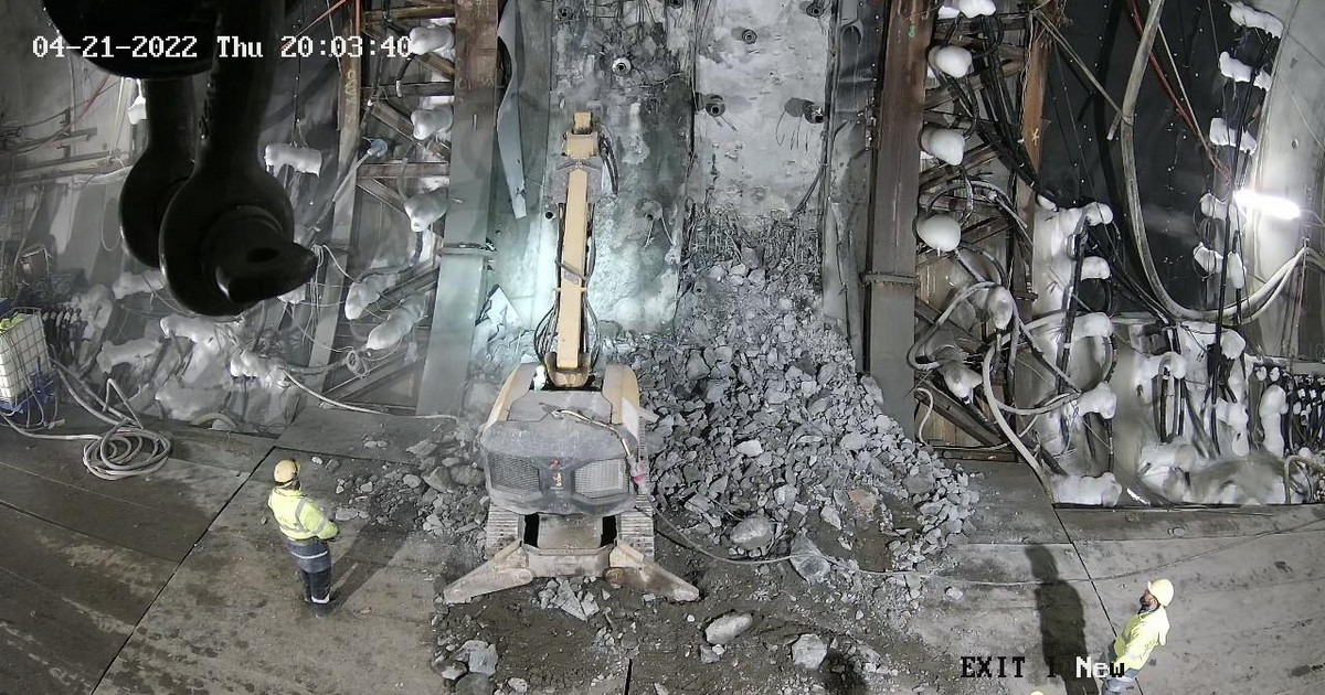 Freezing first, then heavy equipment.  This is how the tunnel in Poland is pierced