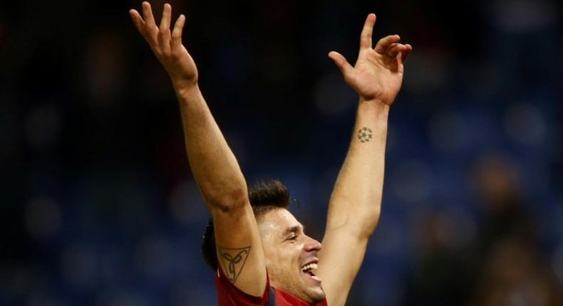 Genoa's forward Giovanni Simeone celebrates at the end the football match Genoa vs Juventus on November 27, 2016